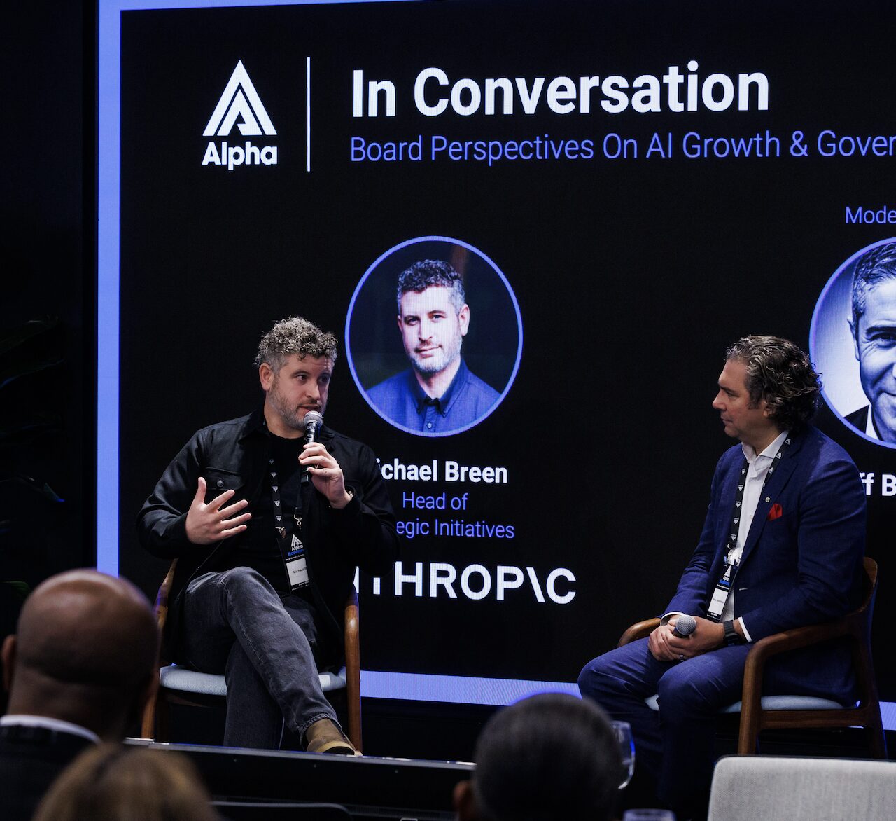 Two leaders in conversation on stage at an Alpha convening.